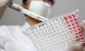 scientist using filler test tube rack