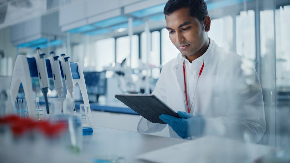 scientist working with cell based assays